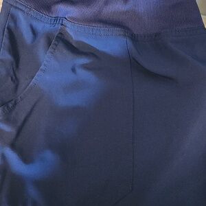 Dickies navy jacket with red logo tag visible